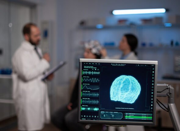 Monitor showing brain activity in professional high end science laboratory
